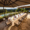 Picture of the table and pool at Villa Rey