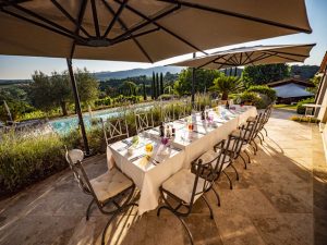 Picture of the table and pool at Villa Rey
